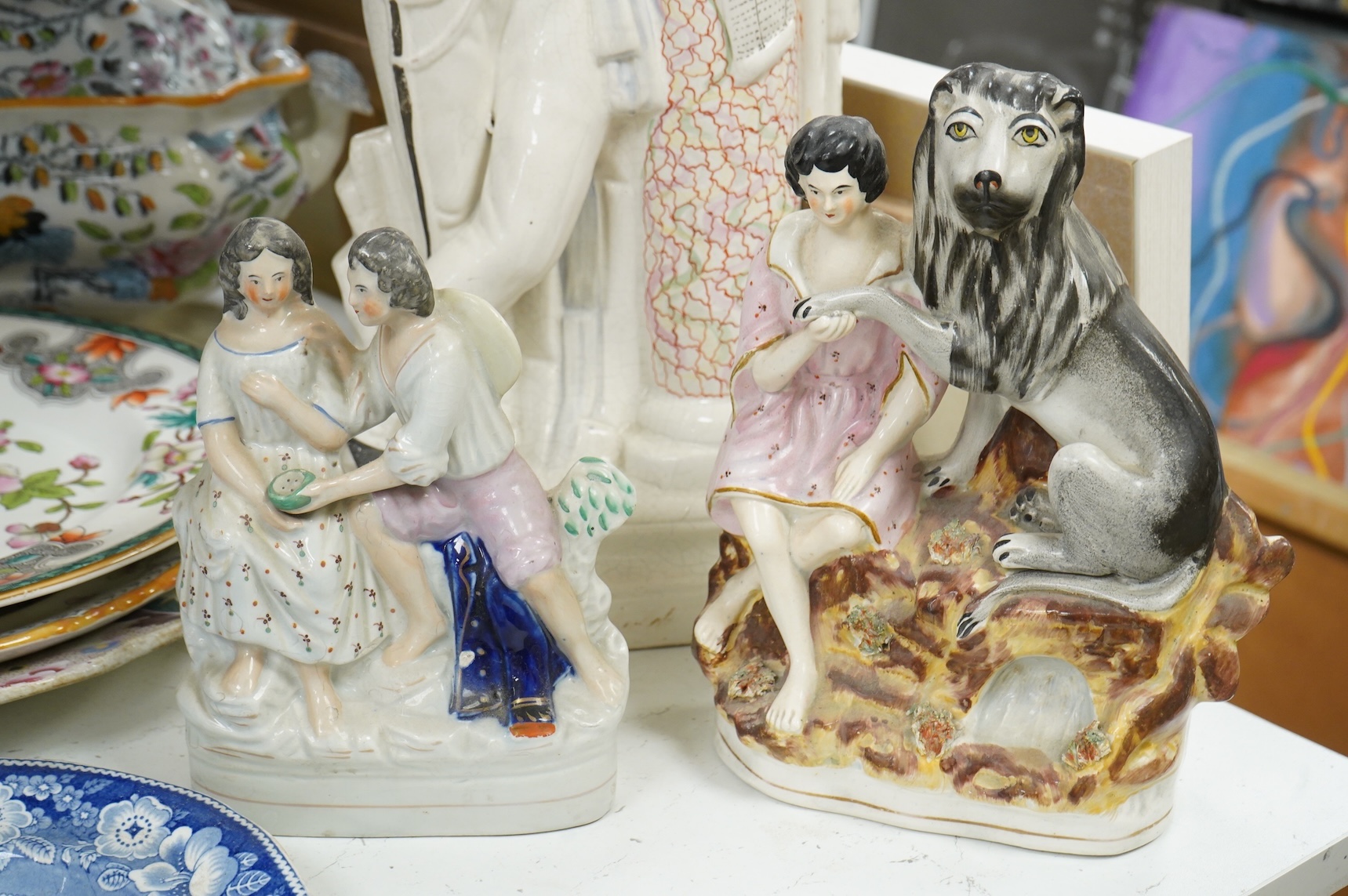 Three 19th century Staffordshire figures, including General Garibaldi, a Staffordshire pottery soup tureen and four serving plates, largest 48cm wide